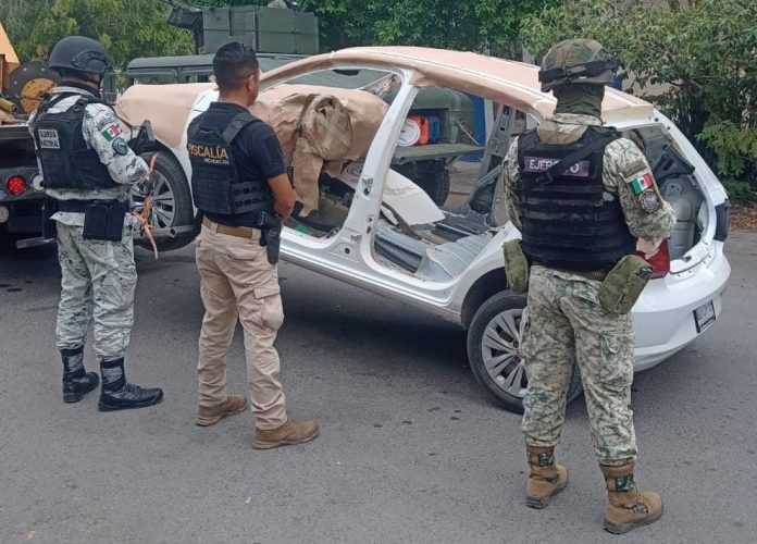 Autoridades desmantelan taller para blindar vehículos, del Cártel de Tepalcatepec